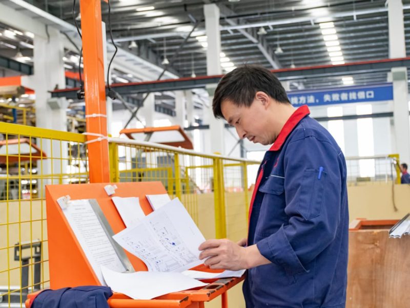YY WINDOWS technicians working in the aluminum window and door production workshop
