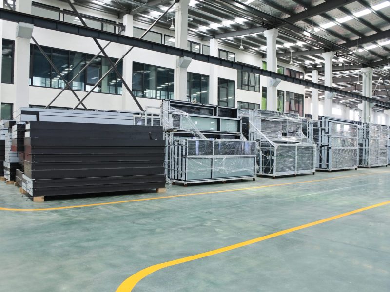 Aluminum window and door components being prepared at the YY WINDOWS factory