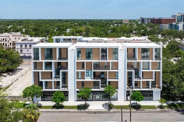 YY WINDOWS aluminum window and door systems at Villa Ballada Condos in Sarasota, Florida